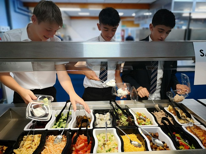 Students choosing food items