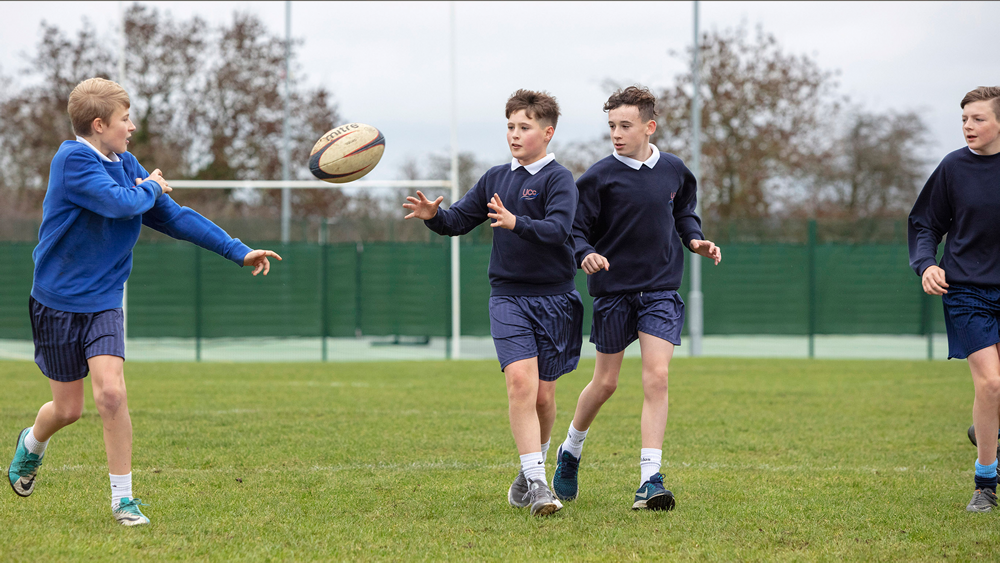 Students playing rugby