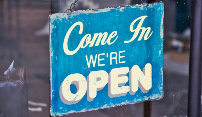 "Come in, We're open" sign